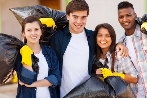 Various waste materials being sorted by muck away professionals