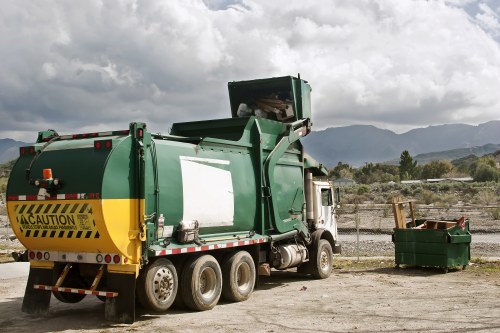 A large builder's skip on a construction site in Euston