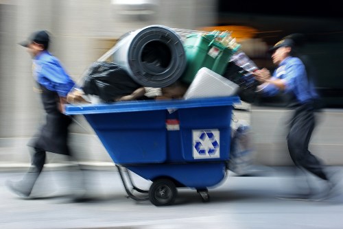 Various types of builders waste including wood, metal, and concrete