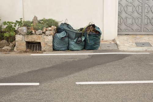 Loading a Skip Bin for Waste Disposal